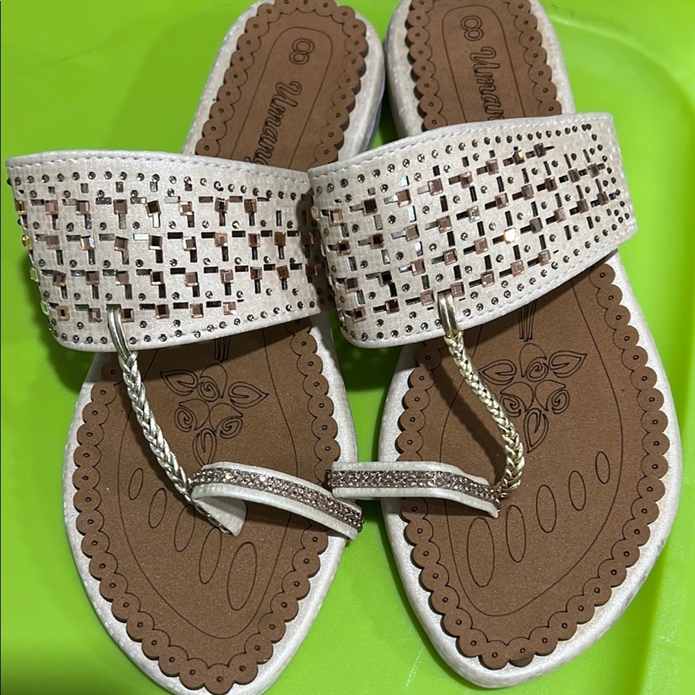 Brand new pair of summer footwear for women size 38